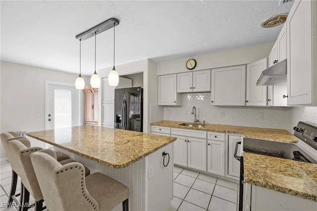 4969 Vincennes St, Cape Coral, FL 33904 - kitchen with black refrigerator with ice dispenser, under cabinet range hood, electric stove, a sink, and light tile patterned flooring
