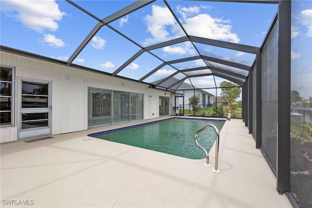 4969 Vincennes St, Cape Coral, FL 33904 - swimming pool featuring a patio area and glass enclosure