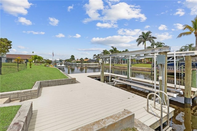 4969 Vincennes St, Cape Coral, FL 33904 - dock featuring boat lift and a water view