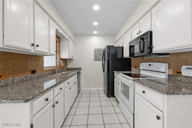 4969 Vincennes St, Cape Coral, FL 33904 - kitchen with white range with electric cooktop, black microwave, dishwashing machine, white cabinets, and a sink
