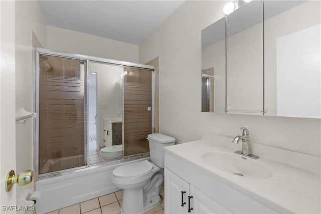 4969 Vincennes St, Cape Coral, FL 33904 - full bathroom featuring vanity, toilet, combined bath / shower with glass door, and tile patterned floors