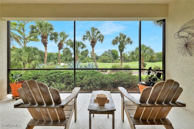 5795 Grande Reserve Way Unit 1001, Naples, FL 34110 - sunroom / solarium with view of golf course