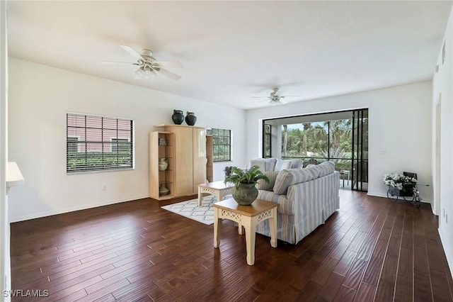 5795 Grande Reserve Way Unit 1001, Naples, FL 34110 - living area with a ceiling fan, dark wood-style floors, and baseboards