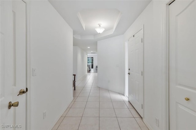 5795 Grande Reserve Way Unit 1001, Naples, FL 34110 - hall with light tile patterned floors and a raised ceiling
