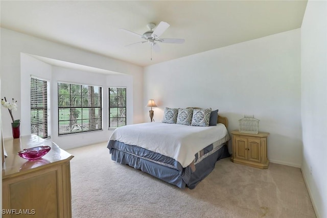 5795 Grande Reserve Way Unit 1001, Naples, FL 34110 - bedroom featuring light carpet and ceiling fan