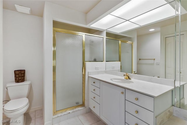 5795 Grande Reserve Way Unit 1001, Naples, FL 34110 - full bath featuring vanity, a stall shower, toilet, and tile patterned floors