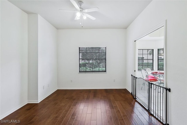5795 Grande Reserve Way Unit 1001, Naples, FL 34110 - spare room featuring wood finished floors, ceiling fan, and baseboards