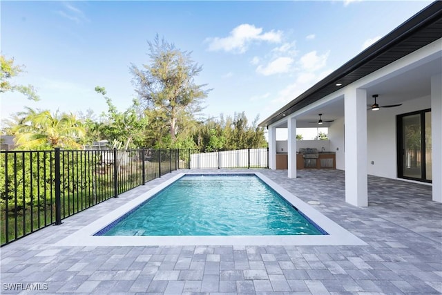 2219 Surfside Blvd, Cape Coral, FL 33991 - view of pool featuring ceiling fan, area for grilling, and a patio