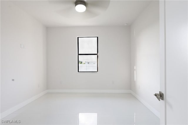 2219 Surfside Blvd, Cape Coral, FL 33991 - tiled empty room with ceiling fan and baseboards