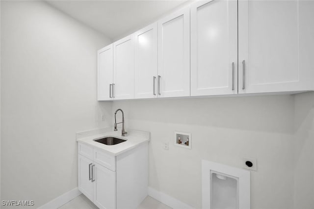 2219 Surfside Blvd, Cape Coral, FL 33991 - laundry room featuring cabinet space, hookup for an electric dryer, washer hookup, and baseboards