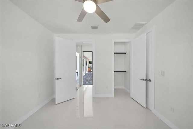 2219 Surfside Blvd, Cape Coral, FL 33991 - unfurnished bedroom featuring baseboards and ceiling fan