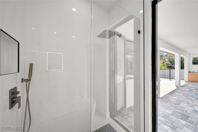 2219 Surfside Blvd, Cape Coral, FL 33991 - bathroom with a shower stall and brick patterned floors