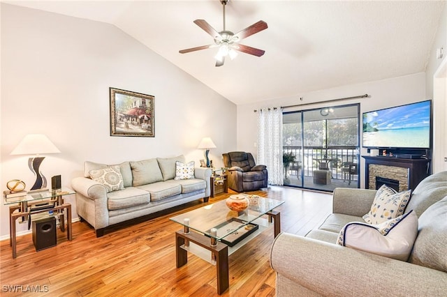 6324 Sugar Bush Ln Unit F, Fort Myers, FL 33908 - living area featuring vaulted ceiling, a ceiling fan, and light wood-style flooring