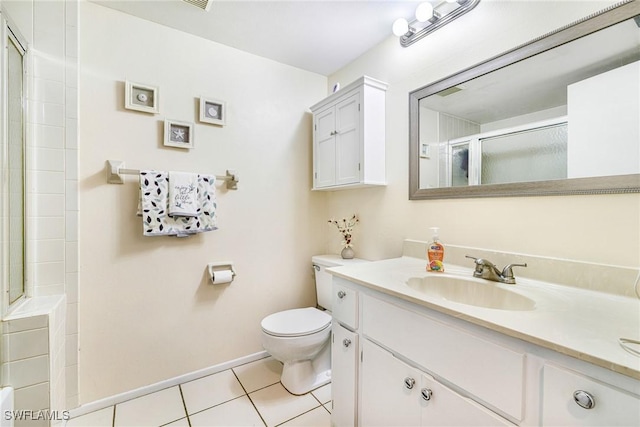 6324 Sugar Bush Ln Unit F, Fort Myers, FL 33908 - full bath with toilet, tile patterned floors, a shower with door, vanity, and baseboards