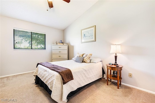 6324 Sugar Bush Ln Unit F, Fort Myers, FL 33908 - bedroom featuring light carpet, lofted ceiling, baseboards, and a ceiling fan