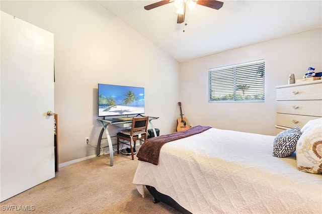6324 Sugar Bush Ln Unit F, Fort Myers, FL 33908 - bedroom with light carpet, vaulted ceiling, a ceiling fan, and baseboards