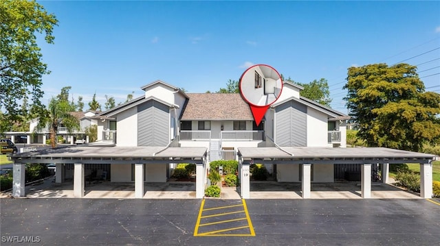 6324 Sugar Bush Ln Unit F, Fort Myers, FL 33908 - view of property with covered parking