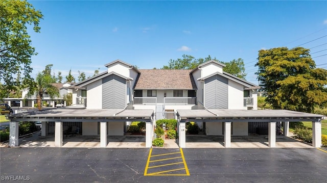 6324 Sugar Bush Ln Unit F, Fort Myers, FL 33908 - view of property with covered parking