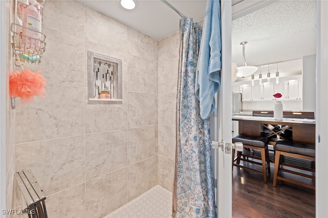 5210 Cedarbend Dr Unit 4, Fort Myers, FL 33919 - full bathroom featuring tiled shower, wood finished floors, and radiator heating unit