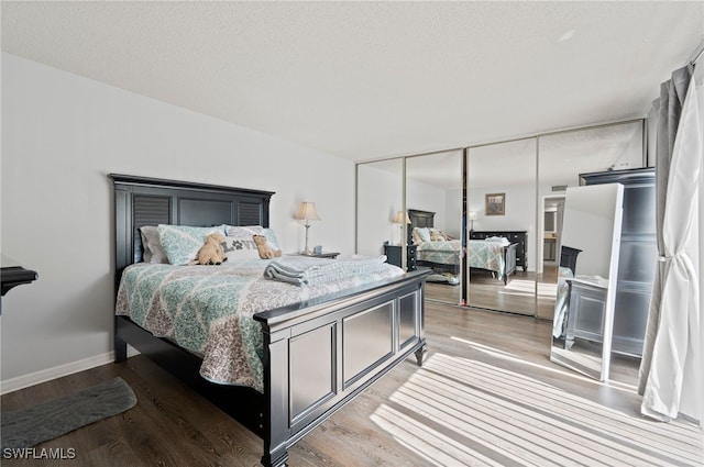 5210 Cedarbend Dr Unit 4, Fort Myers, FL 33919 - bedroom featuring light wood-style floors, a closet, and baseboards