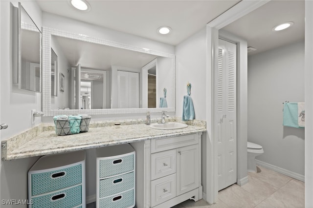 5210 Cedarbend Dr Unit 4, Fort Myers, FL 33919 - bathroom featuring a closet, toilet, vanity, and tile patterned flooring