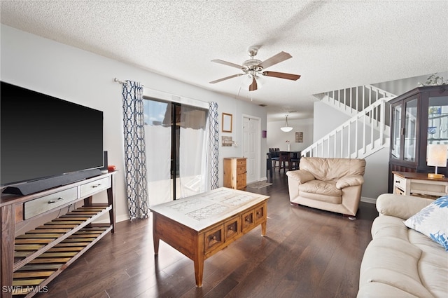 5210 Cedarbend Dr Unit 4, Fort Myers, FL 33919 - living room with stairway, a ceiling fan, wood finished floors, a textured ceiling, and baseboards