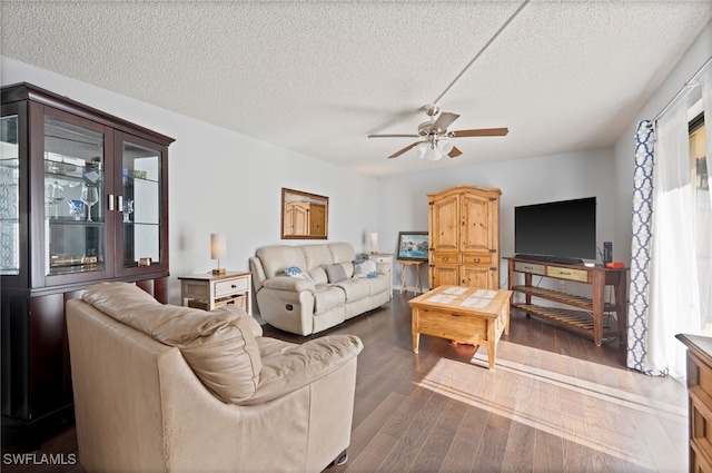 5210 Cedarbend Dr Unit 4, Fort Myers, FL 33919 - living room featuring a textured ceiling, a ceiling fan, and dark wood-style floors