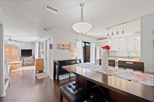 5210 Cedarbend Dr Unit 4, Fort Myers, FL 33919 - kitchen featuring a textured ceiling, a sink, light countertops, white cabinets, and ceiling fan
