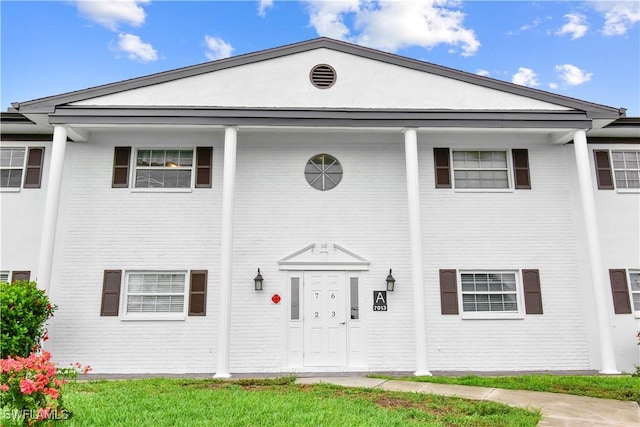 7013 New Post Dr Unit 7, North Fort Myers, FL 33917 - greek revival house with brick siding