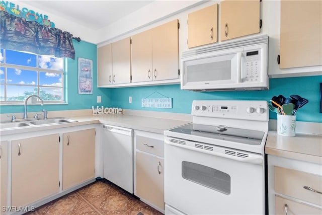7013 New Post Dr Unit 7, North Fort Myers, FL 33917 - kitchen featuring white appliances, a sink, and light countertops