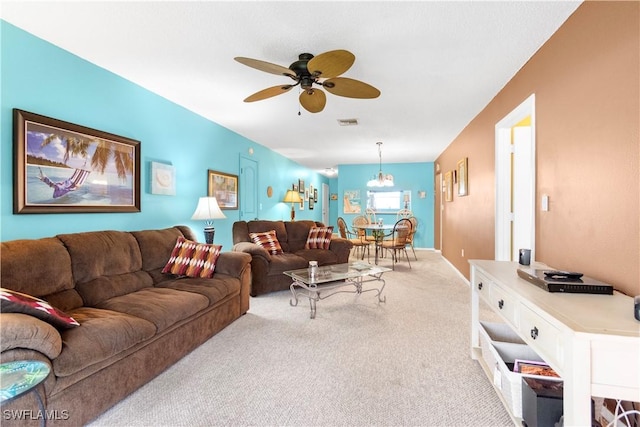 7013 New Post Dr Unit 7, North Fort Myers, FL 33917 - living room with light colored carpet and a ceiling fan