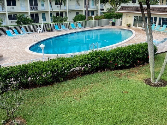 130 N Collier Blvd Unit G6, Marco Island, FL 34145 - community pool featuring a patio area