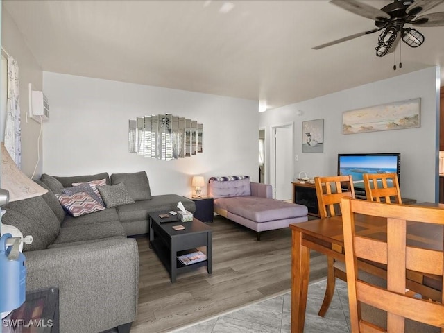 130 N Collier Blvd Unit G6, Marco Island, FL 34145 - living room featuring ceiling fan, wood finished floors, and a wall unit AC