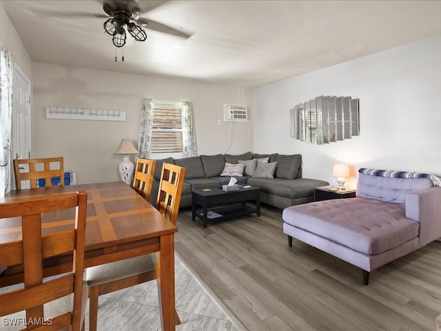 130 N Collier Blvd Unit G6, Marco Island, FL 34145 - living area featuring ceiling fan, light wood-style flooring, and an AC wall unit