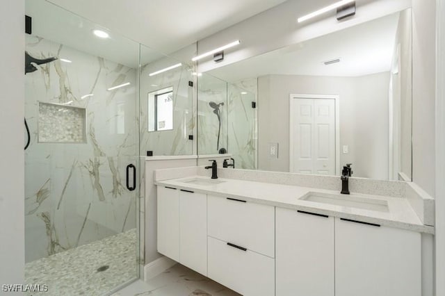1603 Karen Ave S, Lehigh Acres, FL 33976 - full bathroom featuring marble look tiles, a marble finish shower, double vanity, and recessed lighting