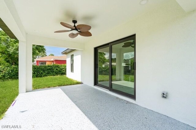 1603 Karen Ave S, Lehigh Acres, FL 33976 - view of patio featuring a ceiling fan