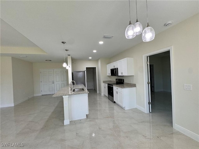 3007 53rd St W, Lehigh Acres, FL 33971 - kitchen with stainless steel appliances, white cabinetry, light stone countertops, baseboards, and recessed lighting