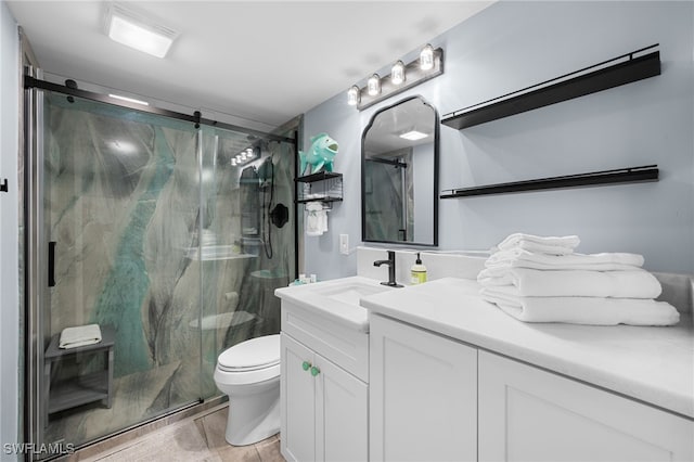 5500 Bonita Beach Rd Unit 502, Bonita Springs, FL 34134 - full bath with toilet, vanity, a marble finish shower, and wood finished floors