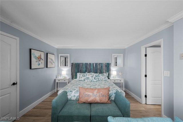 5500 Bonita Beach Rd Unit 502, Bonita Springs, FL 34134 - bedroom featuring wood finished floors, crown molding, and baseboards