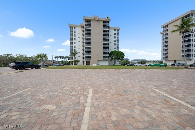 5500 Bonita Beach Rd Unit 502, Bonita Springs, FL 34134 - view of apartment building / complex with uncovered parking