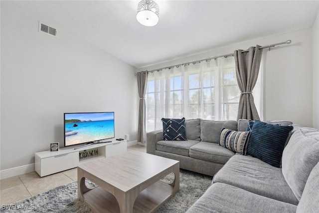 3410 Frosty Way Unit 4802, Naples, FL 34112 - living room with light tile patterned floors and baseboards