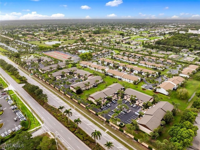 3410 Frosty Way Unit 4802, Naples, FL 34112 - aerial overview of property's location with a nearby body of water and nearby suburban area