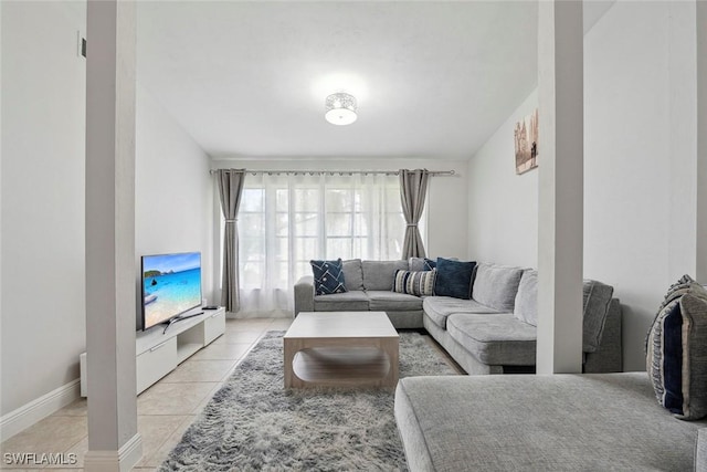 3410 Frosty Way Unit 4802, Naples, FL 34112 - living room featuring light tile patterned floors and baseboards