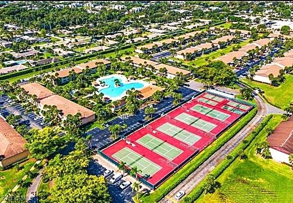 3410 Frosty Way Unit 4802, Naples, FL 34112 - bird's eye view of a pool