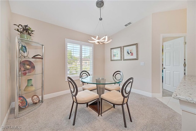 15041 Bridgeway Ln Unit 1006, Fort Myers, FL 33919 - dining room featuring a chandelier, light colored carpet, and baseboards