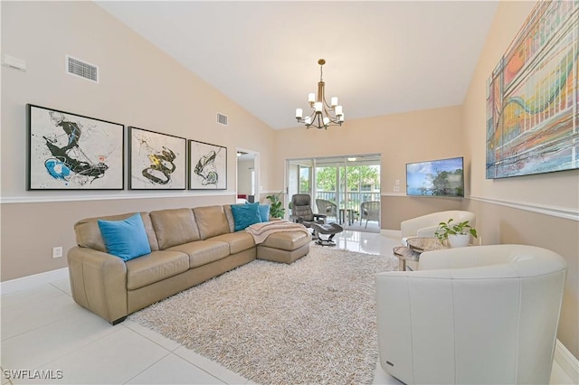 15041 Bridgeway Ln Unit 1006, Fort Myers, FL 33919 - living room featuring a chandelier, tile patterned floors, high vaulted ceiling, and baseboards