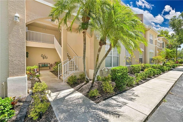 15041 Bridgeway Ln Unit 1006, Fort Myers, FL 33919 - view of building exterior with stairs