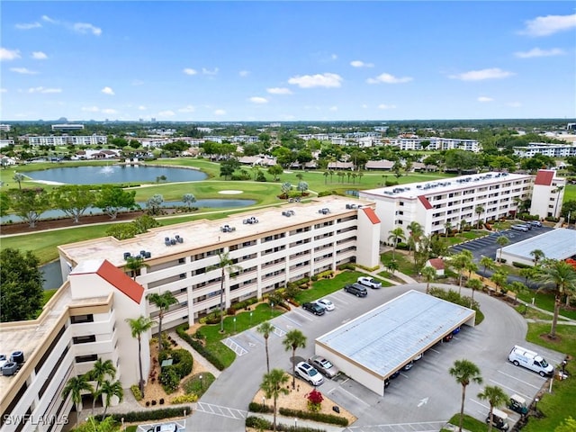 7430 Lake Breeze Dr Unit 211, Fort Myers, FL 33907 - drone / aerial view of apartment complex / building and a large body of water