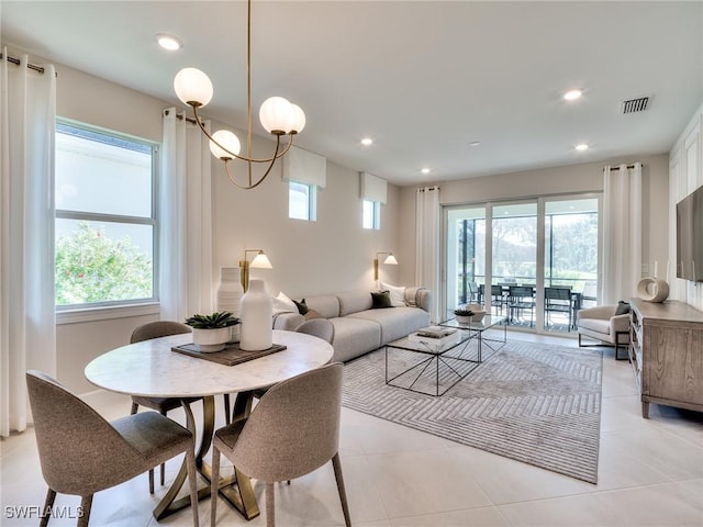 17321 Willow Tree Ln, North Fort Myers, FL 33917 - living room with plenty of natural light, recessed lighting, and light tile patterned floors