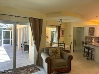 672 Seagrape Dr, Marco Island, FL 34145 - living room featuring light tile patterned flooring